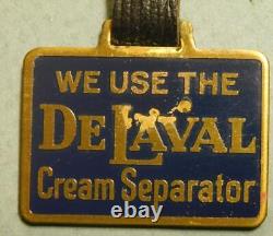 De Laval New Old Stock Dark Blue Enamel Watch Fob with Original Envelope Tray 24