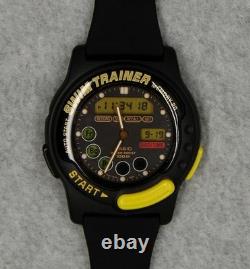 NEW-Old-Stock Vintage Casio SWM-100 SWIM TRAINER Ana-Digi Watch BLACK Dial m. 723