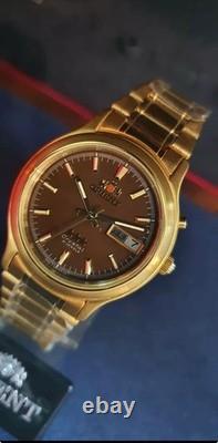 NOS Orient Tristar Automatic Day Date 1EM0200UT8 Brown Dial Made In Japan