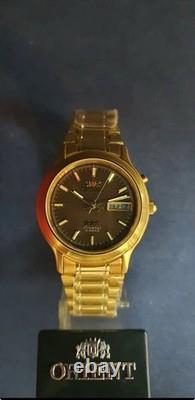 NOS Orient Tristar Automatic Day Date 1EM0200UT8 Brown Dial Made In Japan