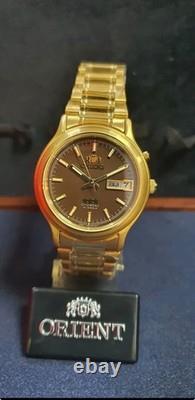 NOS Orient Tristar Automatic Day Date 1EM0200UT8 Brown Dial Made In Japan
