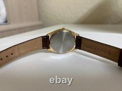 NOS Seiko day and date watch 7n43 Yellow gold plated brown leather band 1980s