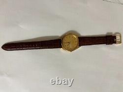 NOS Seiko day and date watch 7n43 Yellow gold plated brown leather band 1980s