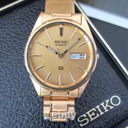 NOS Vintage 1985 Mens Seiko SQ 8123-800L T Day Date Gold Wrist Watch Box Papers