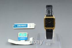 NOS Vintage ORIENT D859V2-40 Women's Quartz Watch Black Dial Gold Tank 20mm