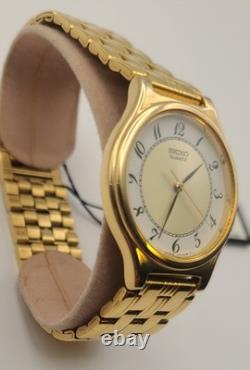 NOSVintage Seiko SFW704 Gold Tone Thin Dress Watch White Dial Arabic Numerals