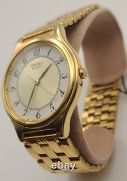 NOSVintage Seiko SFW704 Gold Tone Thin Dress Watch White Dial Arabic Numerals