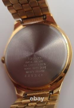 NOSVintage Seiko SFW704 Gold Tone Thin Dress Watch White Dial Arabic Numerals