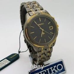 New Seiko Kinetic SKH004P1 Vintage Titanium New Old Stock Grey Gold Tone NOS