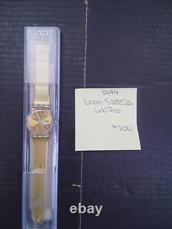 Swatch Originals Brand New Gold Breeze GK710 NOS 1994 needs battery