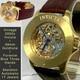 Vintage 39mm Auto Skeleton 17J Goldtone Bezel Brown Strap Invicta Mens Watch