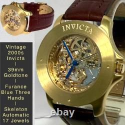 Vintage 39mm Auto Skeleton 17J Goldtone Bezel Brown Strap Invicta Mens Watch