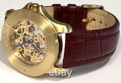 Vintage 39mm Auto Skeleton 17J Goldtone Bezel Brown Strap Invicta Mens Watch