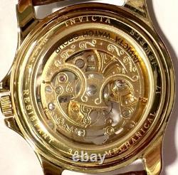 Vintage 39mm Auto Skeleton 17J Goldtone Bezel Brown Strap Invicta Mens Watch