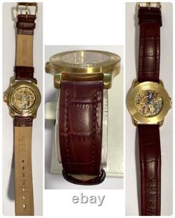 Vintage 39mm Auto Skeleton 17J Goldtone Bezel Brown Strap Invicta Mens Watch