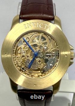 Vintage 39mm Auto Skeleton 17J Goldtone Bezel Brown Strap Invicta Mens Watch