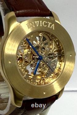 Vintage 39mm Auto Skeleton 17J Goldtone Bezel Brown Strap Invicta Mens Watch