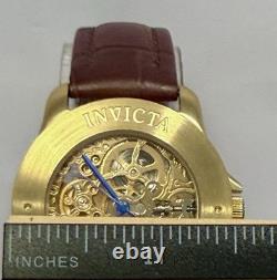 Vintage 39mm Auto Skeleton 17J Goldtone Bezel Brown Strap Invicta Mens Watch