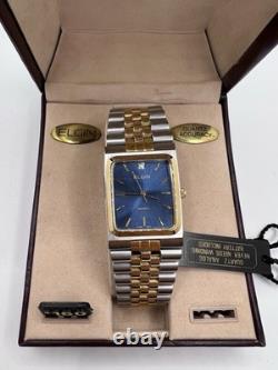 Vintage New Old Stock Elgin Tank Gold Silver Tone Blue Face Men's Watch Classy