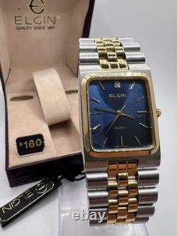 Vintage New Old Stock Elgin Tank Gold Silver Tone Blue Face Men's Watch Classy