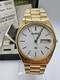 Vintage New Old Stock Gold Tone Helbros HQ Day Date Box Watch Classy Sporty