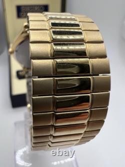 Vintage New Old Stock Seiko SQ Day Date Gold Tone Elegant Sporty Stretch Band
