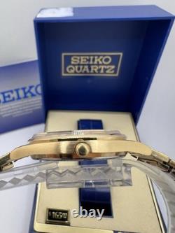 Vintage New Old Stock Seiko SQ Day Date Gold Tone Elegant Sporty Stretch Band
