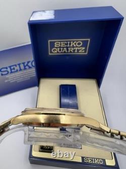 Vintage New Old Stock Seiko SQ Day Date Gold Tone Elegant Sporty Stretch Band