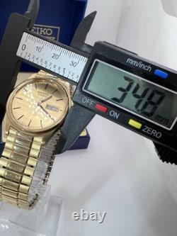Vintage New Old Stock Seiko SQ Day Date Gold Tone Elegant Sporty Stretch Band