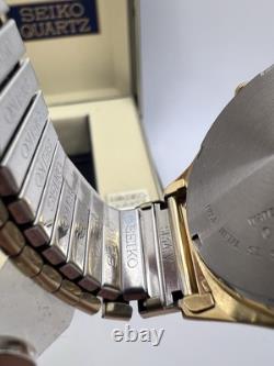 Vintage New Old Stock Seiko SQ Day Date Gold Tone Elegant Sporty Stretch Band