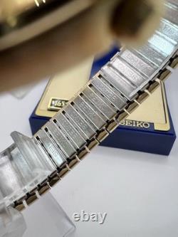 Vintage New Old Stock Seiko SQ Day Date Gold Tone Elegant Sporty Stretch Band