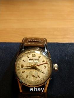 Vintage & RARE 1953 Gruen Calendar Triple Date Watch, withNOS Leather Cuff Band