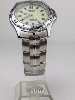 Vtg NEW OLD STOCK Lorus Silver Tone Quartz Date Watch Glow 37mm Men's V732-0G20